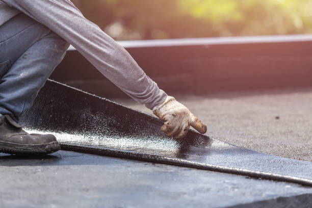 Professional Basement Waterproofing technician working in Bath, IN